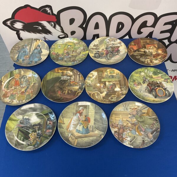 Set of Wedgwood Wing and the Willows collectible plates on display.