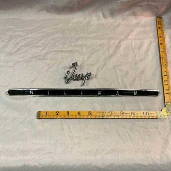 Vintage Hillman Imp badges for classic car restoration.