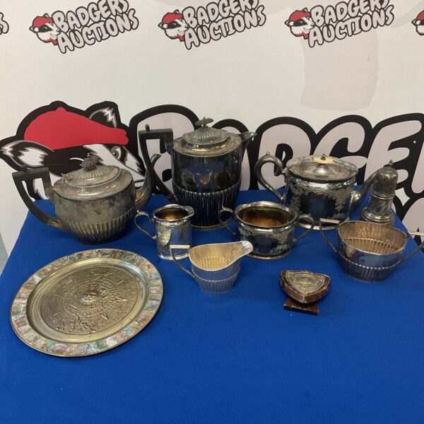 Antique silver plate tea set with teapot, jug and bowl.