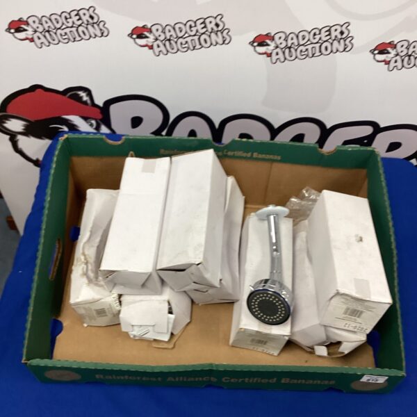Lot of multiple chrome shower heads for bathroom fixtures.