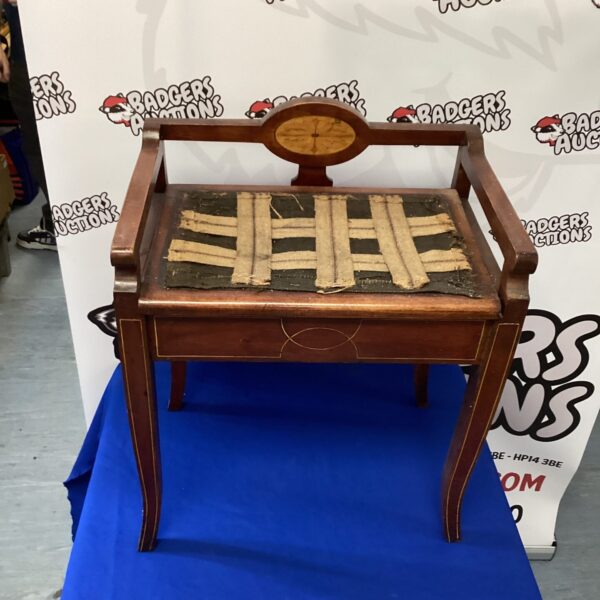 Antique Victorian piano stool with mahogany tripod base.