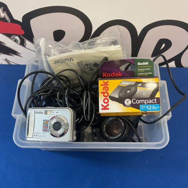 Vintage camera lot featuring Kodak and Vivitar brands for collectors.