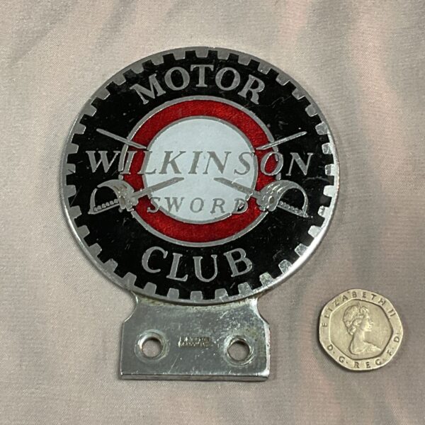Vintage Wilkinson Sword Motor Club badge for classic cars.