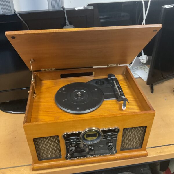 Copper retro music centre with record player, CD and cassette functionality.