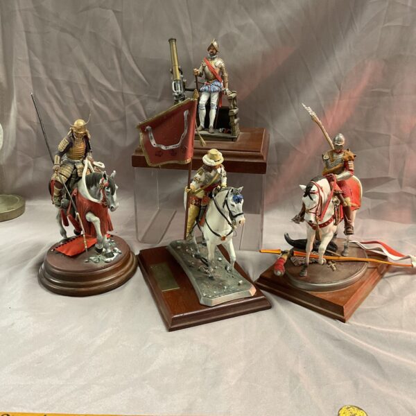 Group of vintage pewter mounted soldiers including a samurai.
