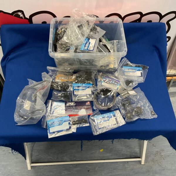 New RC car parts and accessories lot with Hobao branding.