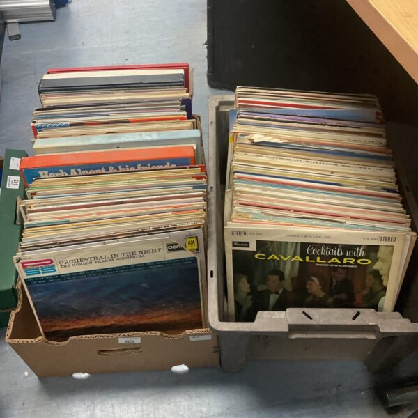 Large lot of vintage vinyl records for collectors and music lovers.