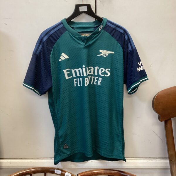 Green Arsenal away football shirt, vintage jersey for collectors.