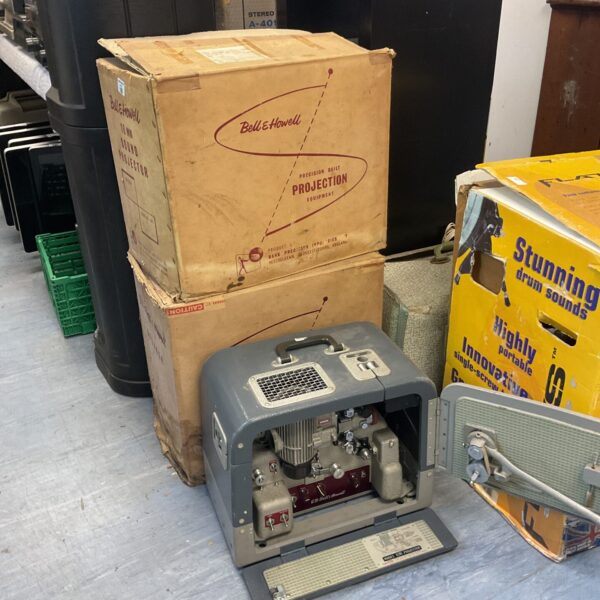 Vintage Bell & Howell 16mm sound projector with original box.