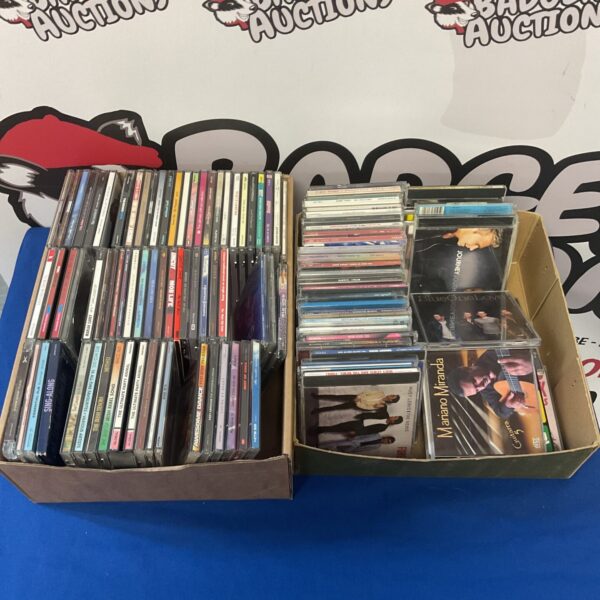 Mixed lot of music CDs for sale, diverse album collection.