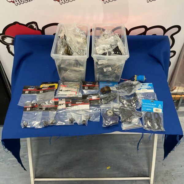 Mixed lot of RC model parts and accessories, including Rocket RC.