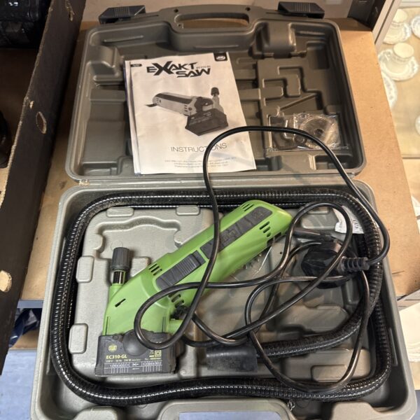 Exakt EC310-GL miniature saw in its original carrying case.