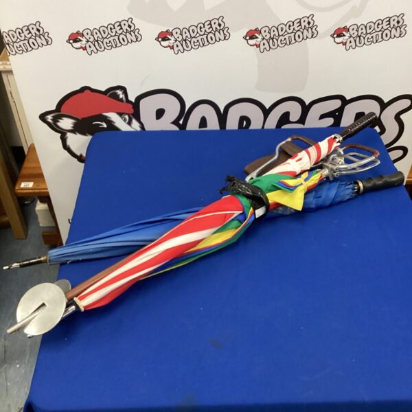 Mixed lot of vintage umbrellas and a shooting seat for collectors.