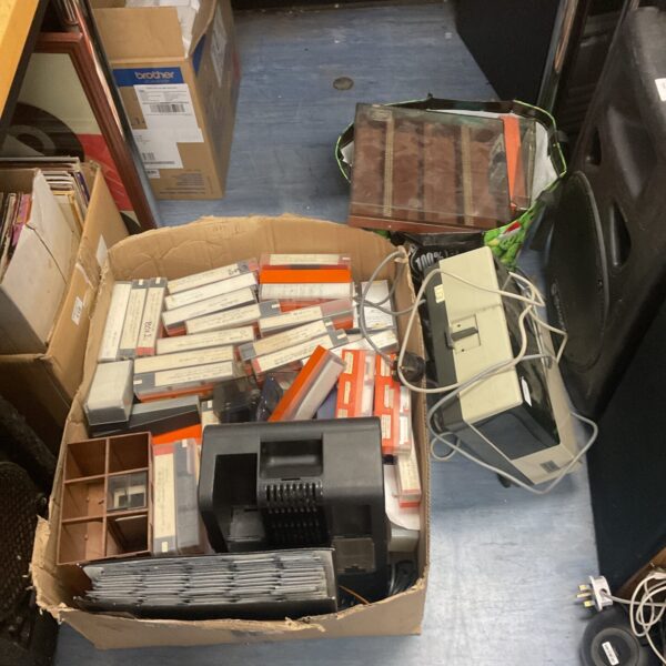 Vintage 35mm slide projector and slides collection for sale.