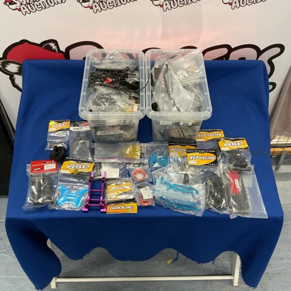 Mixed lot of new RC car parts and accessories, including HSP.
