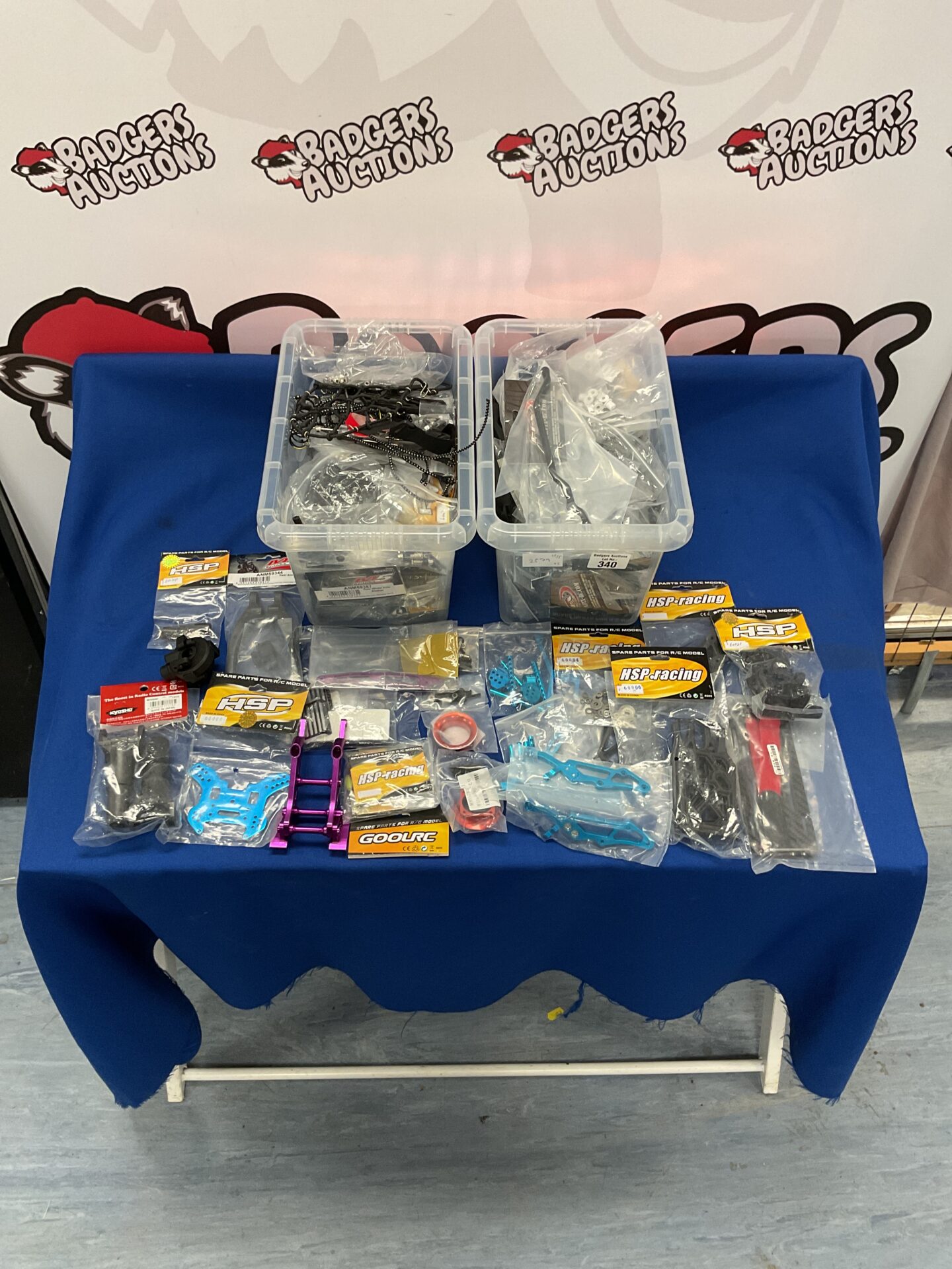 340 Two boxes of mixed new model rc parts and accessories inc HSP