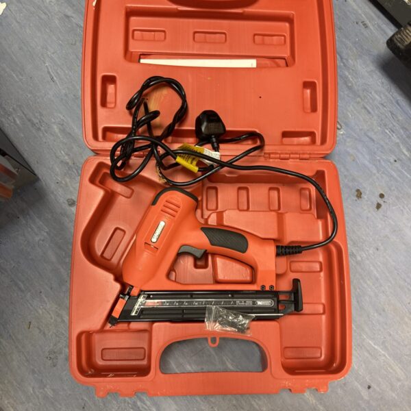 Vintage Tacwise electric stapler in its original carrying case.