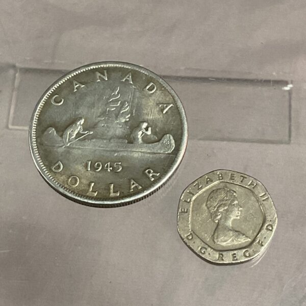 1945 Canada Silver Dollar obverse with maple leaf design.