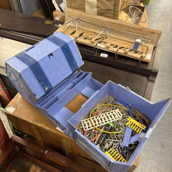 Blue Rolykit toolbox open with tools and hardware inside.
