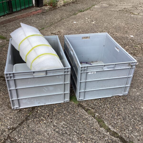 Large plastic storage crates for home or industrial use.