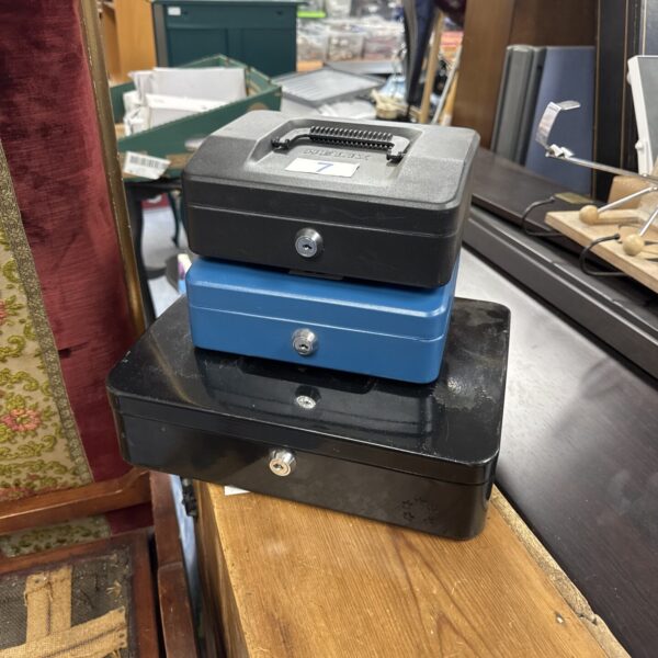 Set of three vintage cash tins, including a Helix model.