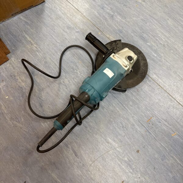 Makita GA9050 angle grinder, a powerful and durable cutting tool.