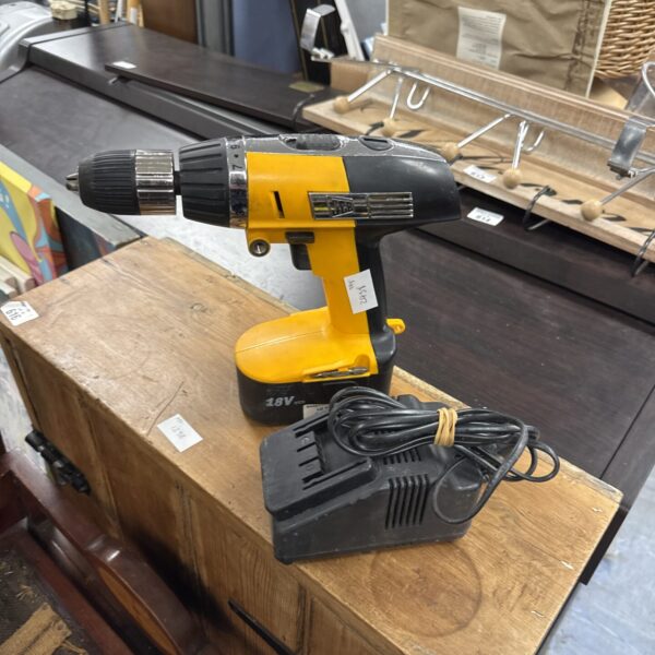 JCB 18V cordless drill with charger, used condition.
