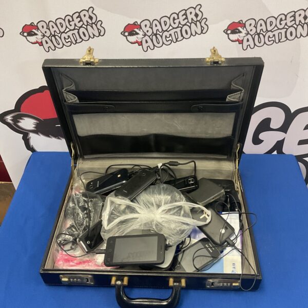Briefcase filled with a lot of used mobile phones and accessories.