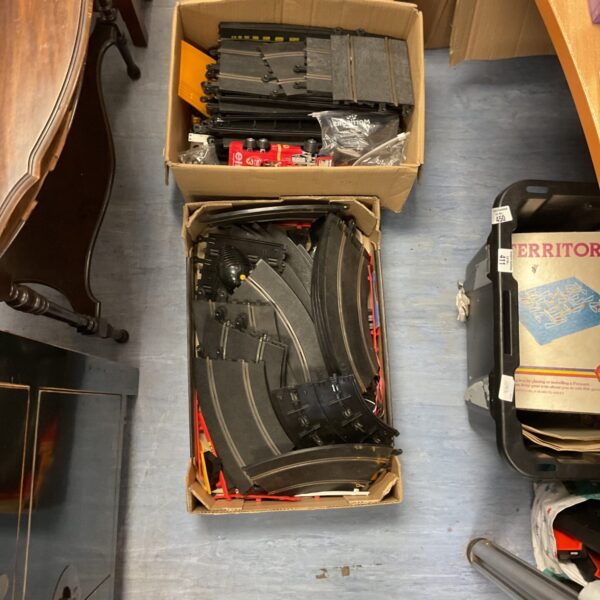 Scalextric track set in two boxes, vintage racing cars.