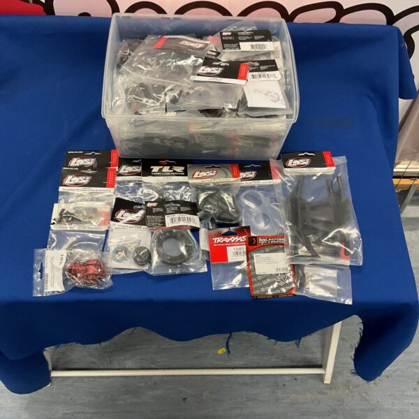 New Losi RC car parts and accessories lot for hobbyists.