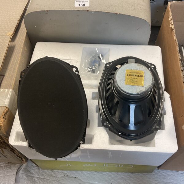 Pair of Chrysler Infinity 6x9 speakers in foam packaging.
