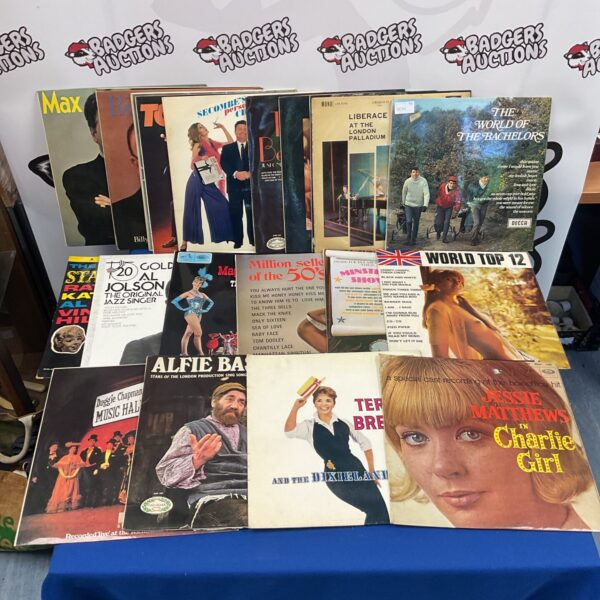 Vintage vinyl record collection lot featuring 1960s pop music artists.