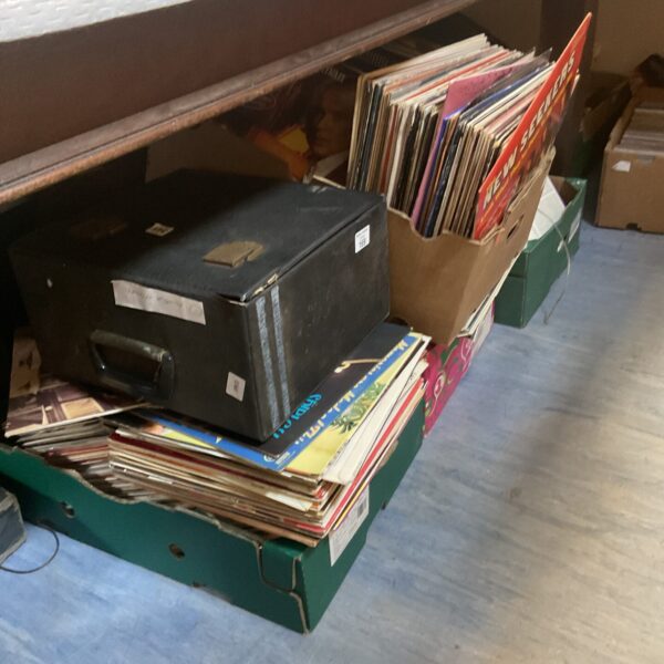 Five boxes of vinyl records for sale, a large music collection.