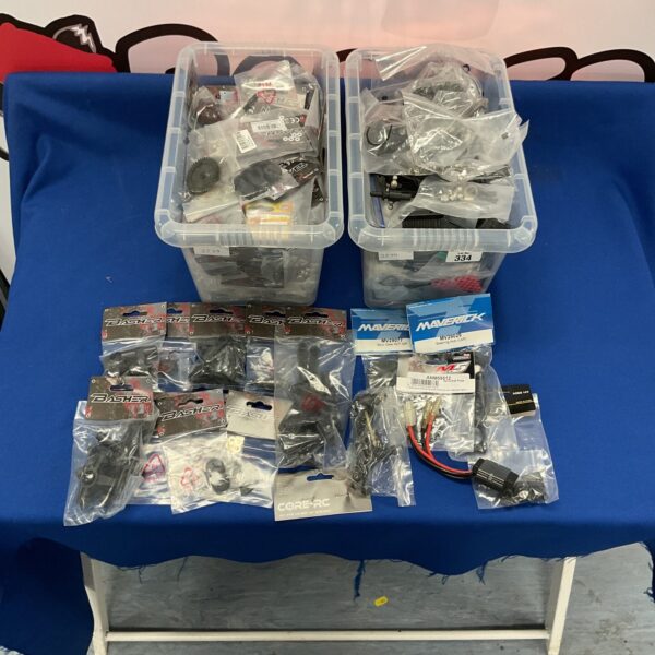 Mixed lot of new RC model parts and accessories, including Basher components.