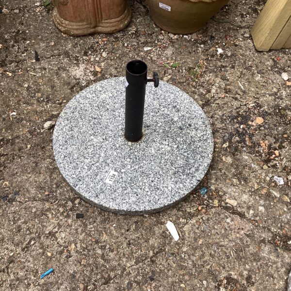 Heavy granite parasol base for garden or patio use.
