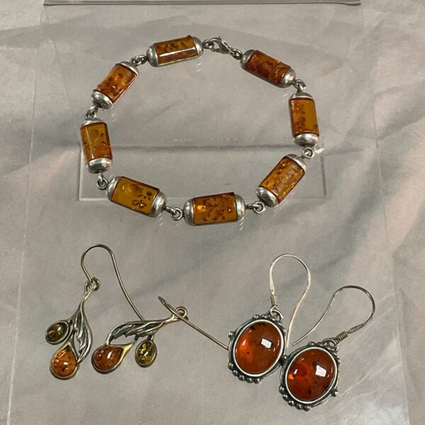 Vintage silver and amber jewellery set with necklace and earrings.