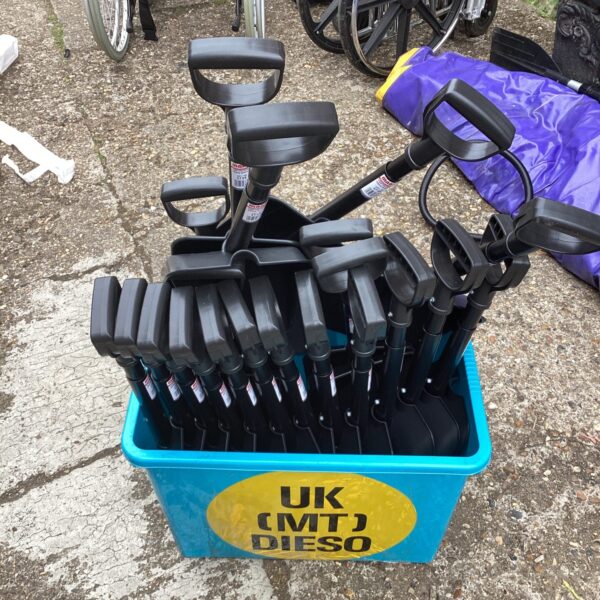 Lot of folding snow shovels for winter car emergency kits.