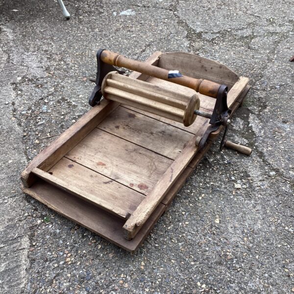 Antique wooden butter roller for making butter.