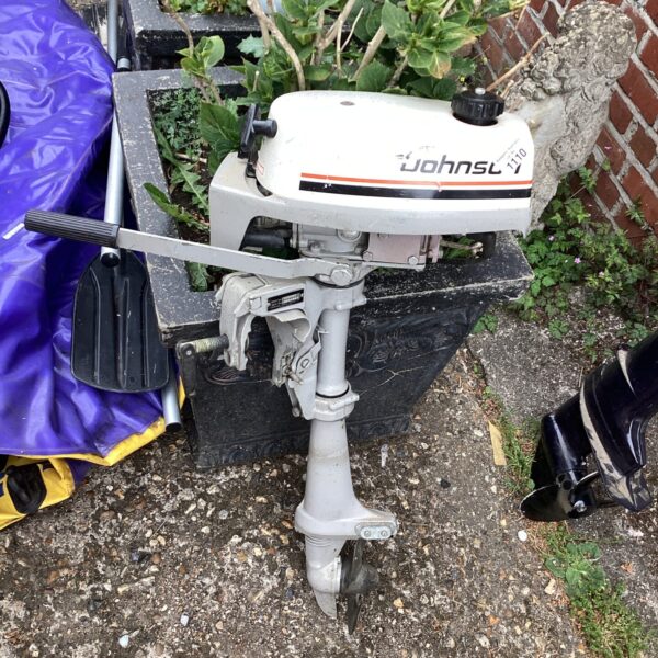 Vintage Johnson Sea Horse outboard motor in used condition.