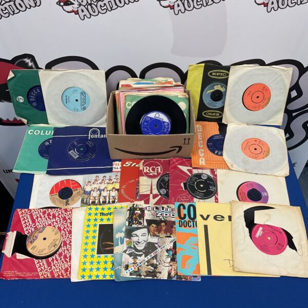 Selection of vintage 7 inch vinyl records for collectors.