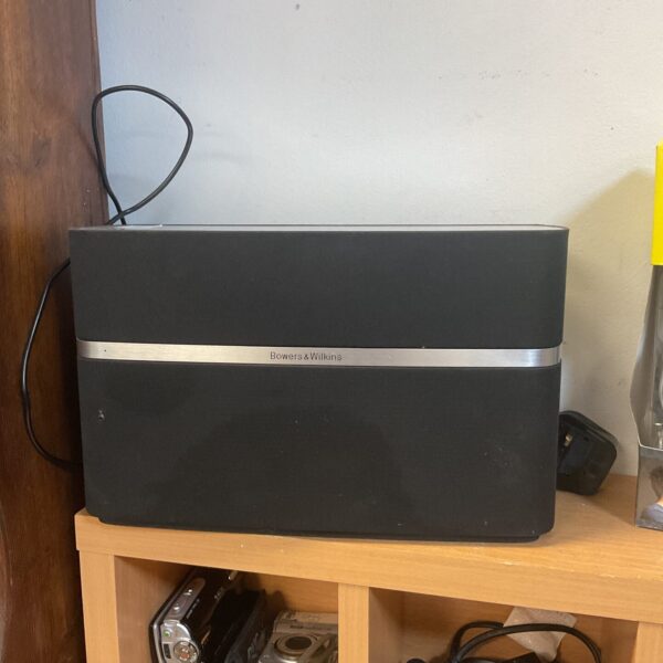 Bowers & Wilkins A5 wireless speaker in a home setting.