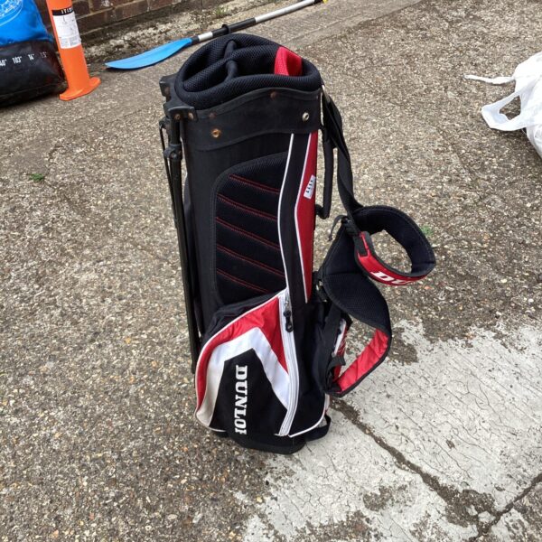 Front view of a Dunlop golf carry bag with multiple pockets.