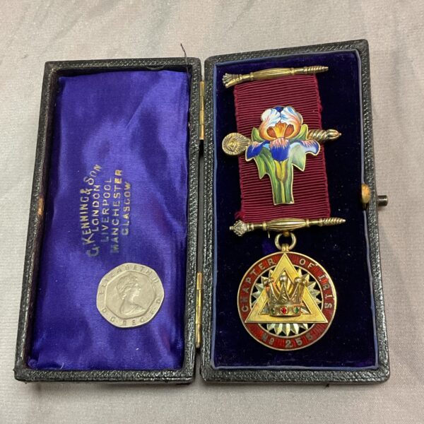 Open case displaying antique silver Masonic Jewel Chapter of Iris.