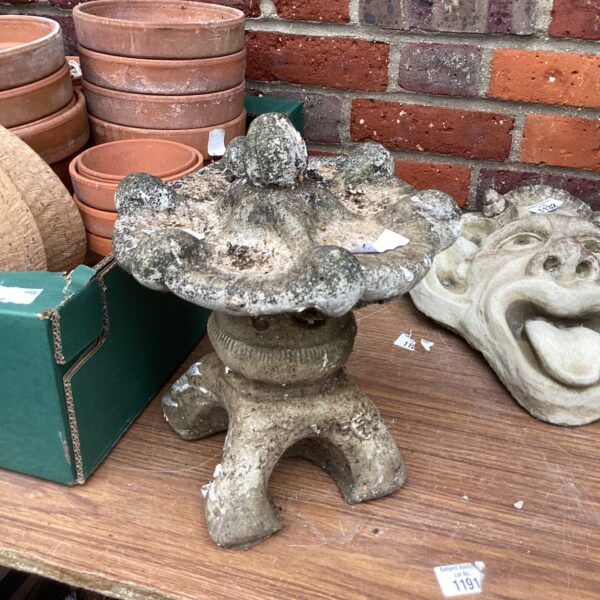 Antique Chinese garden ornament, a weathered stone Foo Dog sculpture.