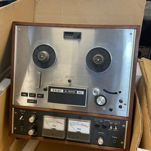 Vintage Teac A-4010 SL reel to reel recorder with VU meters.