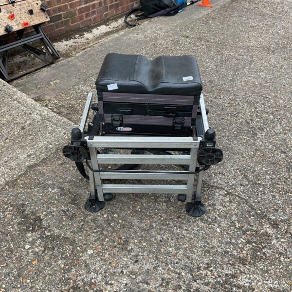 Used Carbonile fishing tackle box with compartments and seat.