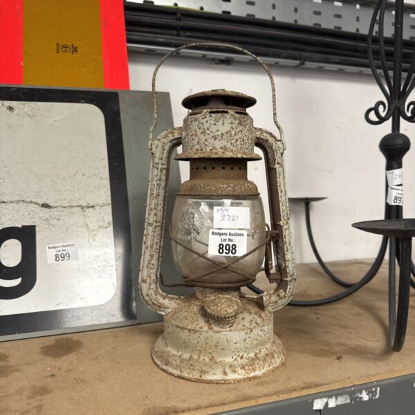 Vintage Feuerhand paraffin lantern, showing signs of age.