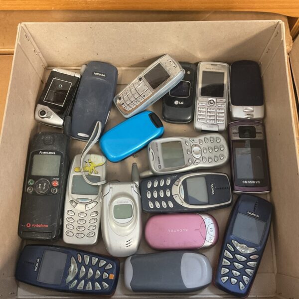 Vintage mobile phone lot including Nokia and Samsung handsets.