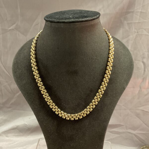 9ct gold brick link chain necklace displayed on a mannequin.