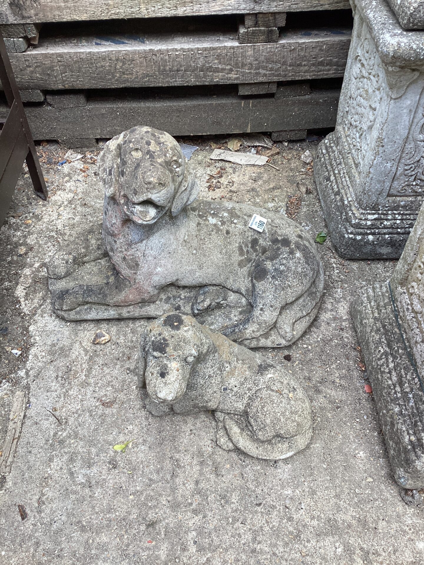 1160 Two dog stone garden ornaments